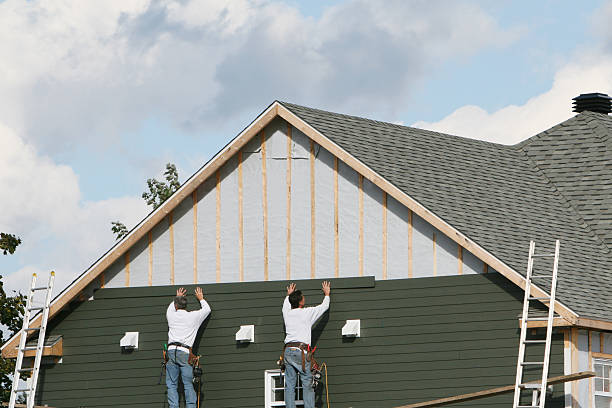 Professional Siding technician working in Oxford, PA